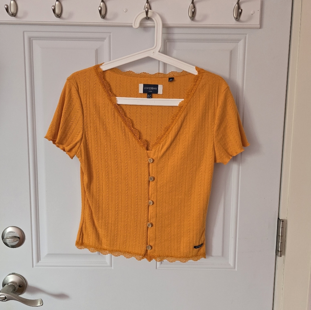 Gold colored shirt with buttons